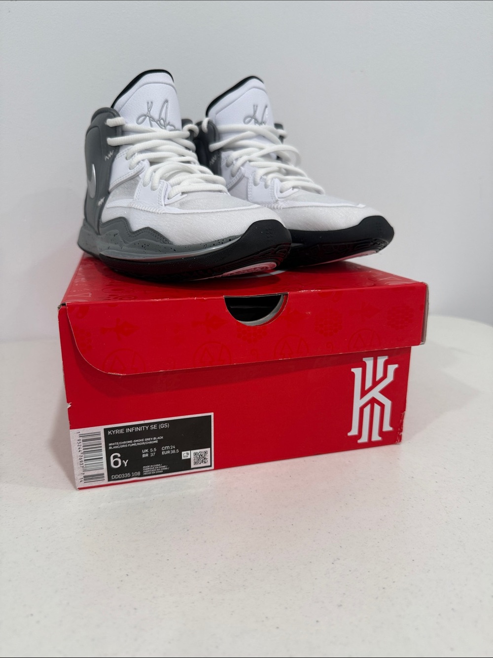 Nike Kids' High-Top Sneakers in White and Gray